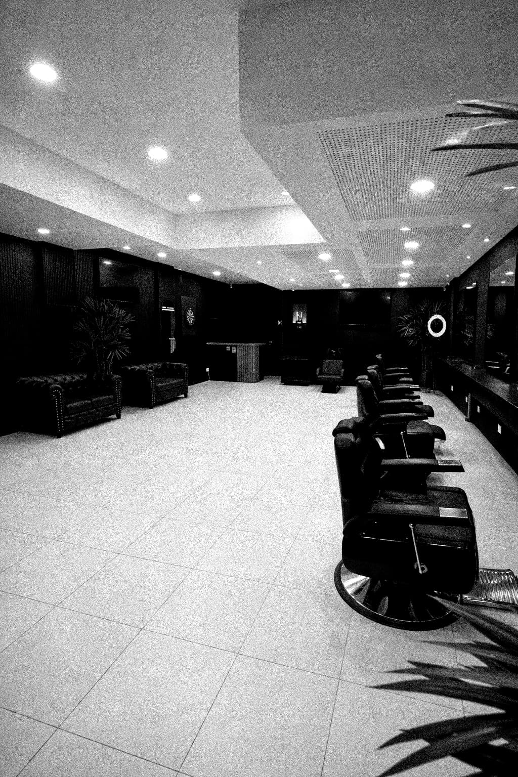 Interior de una barbería Manly